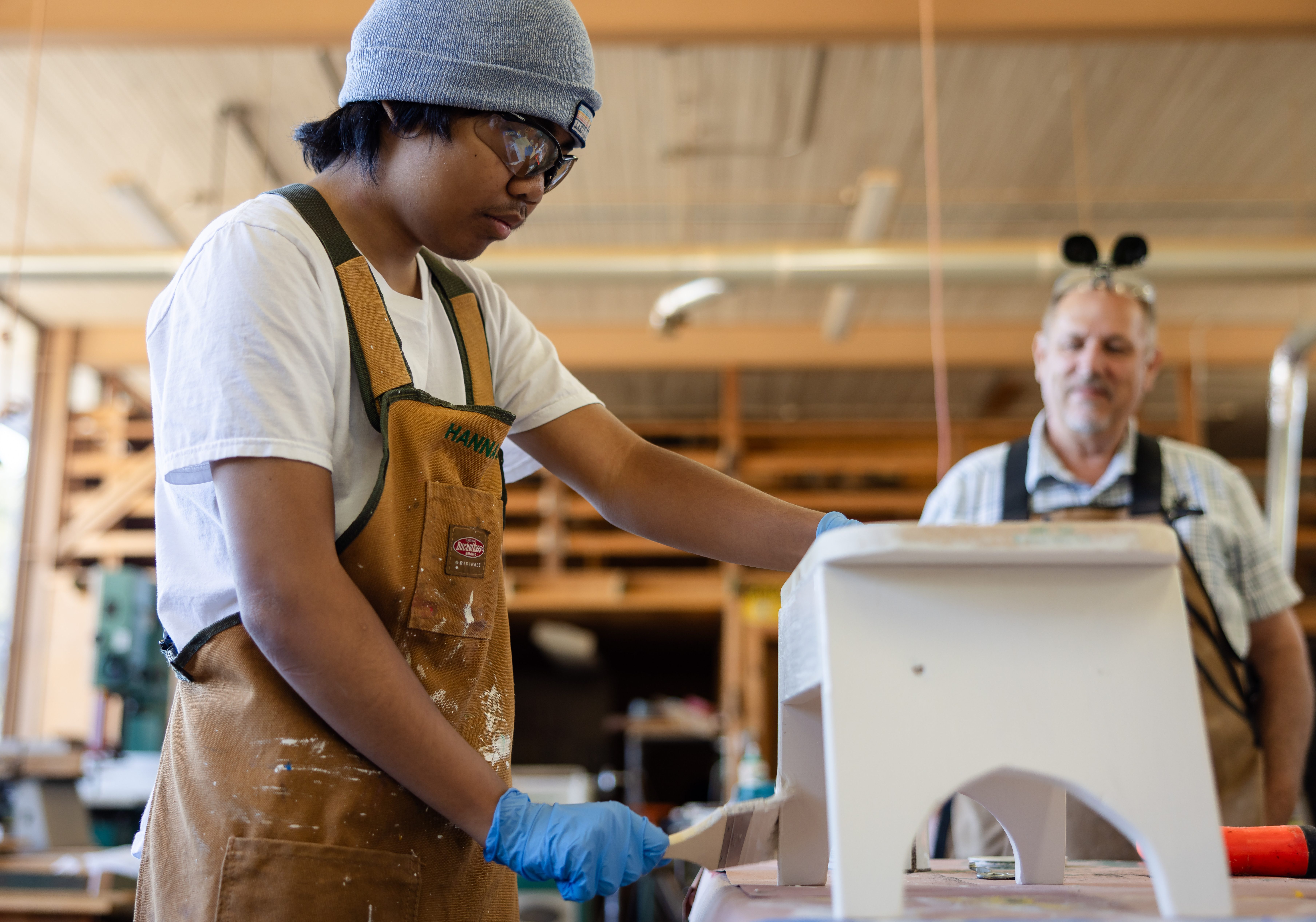 Hanna Academy student working on a hands-on CTE project in the woodshop.
